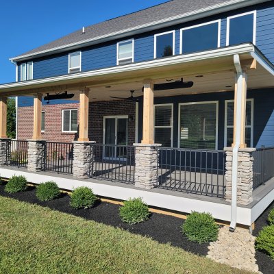 stone veneer columns and cedar wrap